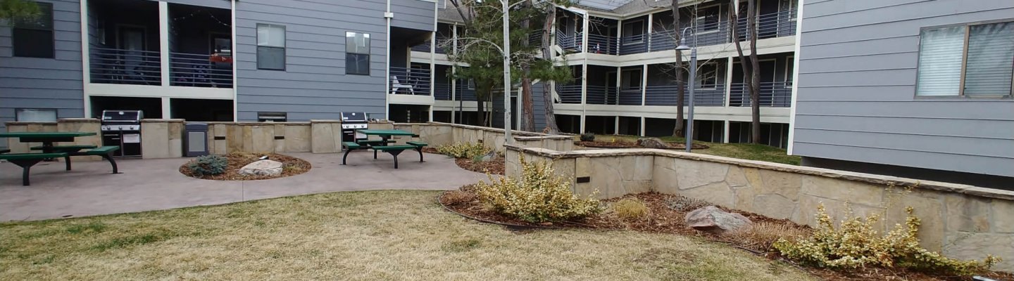 Outdoor picnic area at Blue Sky Lofts Apartments